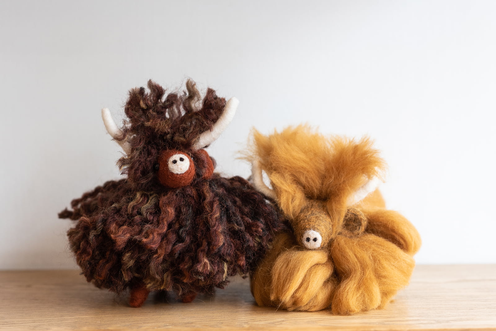 Hand made felted highland cows